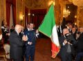 The President Napolitano entrusts the Italian tricolour flag to Zoeggeler and Chiarotti. “Sporting symbol of young and victorious Italy”